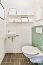 Stylish washroom with many paintings Royalty Free Stock Photo