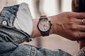 Stylish casual watch on man hand