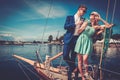 Stylish wealthy couple on a luxury yacht Royalty Free Stock Photo