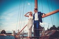 Stylish wealthy couple on a yacht Royalty Free Stock Photo