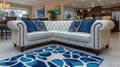 Stylish white sectional sofa with blue accents in a modern home Royalty Free Stock Photo