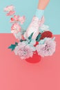 Stylish white shoes. Sneakers and flowers. Summer mood vanilla concept. Ideal for bloggers, websites, magazines Royalty Free Stock Photo