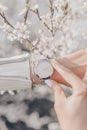 Stylish elegant classic white watch on woman hand