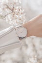 Stylish fashion white watch on woman hand