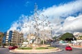 Stylish windmill on traffic roundabout in Benalmadena. Andalusia