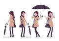 Stylish woman in autumn wear standing with umbrella