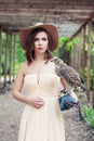 Stylish woman with bird outdoors portrait Royalty Free Stock Photo