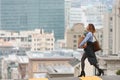 Stylish Woman Carrying Groceries Crosses Scenic San Francisco Street