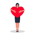 Stylish woman holding a big heart