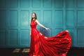 Stylish Woman in Red Dress. Glamourus Beautiful Fashion Model Royalty Free Stock Photo