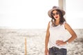 Stylish woman at the summer beach in a hot day Royalty Free Stock Photo