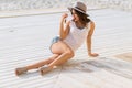 Stylish woman at the summer beach in a hot day Royalty Free Stock Photo