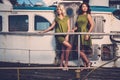 Stylish women on old boat Royalty Free Stock Photo