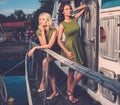 Stylish women on old boat Royalty Free Stock Photo