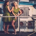 Stylish women on old boat Royalty Free Stock Photo