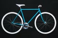 Stylish womens blue bicycle isolated on black