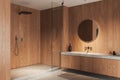 Stylish wooden home bathroom interior with douche and sink, accessories