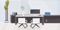 Stylish workplace with computer monitor at office modern cabinet interior empty no people room with furniture flat Royalty Free Stock Photo