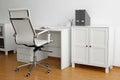 Stylish workplace interior with office chair and desk