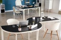 Stylish workplaces with modern devices in office
