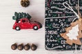 Stylish wrapped gift boxes top view, with ornaments and car toy Royalty Free Stock Photo