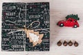 Stylish wrapped gift boxes top view, with ornaments and car toy Royalty Free Stock Photo