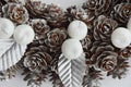 A wreath of cones. Decoration for Christmas and New year. Beautiful decor for a festive interior. Royalty Free Stock Photo