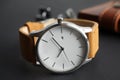 Stylish wrist watch on dark background. Royalty Free Stock Photo
