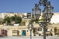 Stylish wrought iron street lamp with blue sky