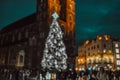 Stylish christmas golden illumination and Christmas tree. Krakow, Poland, Main Square and Cloth Hall in the winter Royalty Free Stock Photo