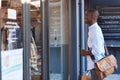 Stylish young African man out window shopping in the city Royalty Free Stock Photo