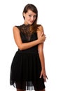 A stylish young brunette woman in black dress in little black dr Royalty Free Stock Photo