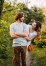 Stylish young couple. Film photo. Appearance and clothes for a photo shoot of a love story. The girl hugs the guy Royalty Free Stock Photo