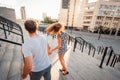 Stylish young couple teenagers in love in the city, summer sunny day Royalty Free Stock Photo