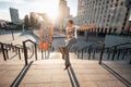 Stylish young couple teenagers in love in the city, summer sunny day Royalty Free Stock Photo