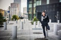 Stylish Young Handsome Man in Black Coat Standing Royalty Free Stock Photo