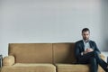 Stylish young man in a suit and bow tie. Business style. Fashionable image. Evening dress. man standing and looking Royalty Free Stock Photo