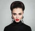 Stylish Young Woman with Hair Bun Hairdo Royalty Free Stock Photo