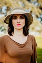 Stylish young woman with straw hat Royalty Free Stock Photo