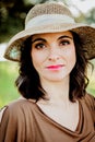 Stylish young woman with straw hat Royalty Free Stock Photo