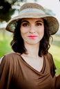 Stylish young woman with straw hat Royalty Free Stock Photo