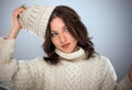 Stylish young woman in winter knitwear