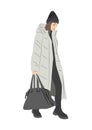 Stylish young woman in winter street fashion clothes