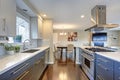 Stylishly updated kitchen with stainless steel appliances.