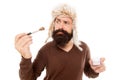 Stylist career. Freak visagiste. Applying makeup face tone. Powder cosmetics. Man bearded stylist wear hat hold brush Royalty Free Stock Photo