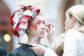 Stylist and model on show for creative makeup