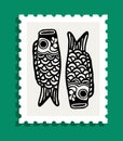 Stylized black carp fish illustration on a postage stamp with green background Royalty Free Stock Photo