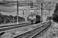 Stylized black-and-white landscape with a Russian Railways electric train