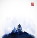 Stylized blue ink wash painting with pine trees on the hill in mist. Traditional oriental ink painting sumi-e, u-sin, go Royalty Free Stock Photo