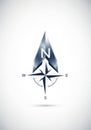 Stylized compass design featuring a prominent, glossy arrowhead Royalty Free Stock Photo
